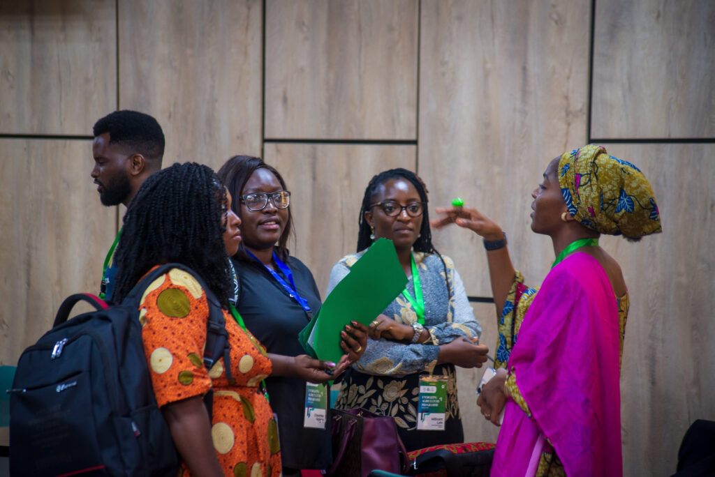 Women speaking at a conference